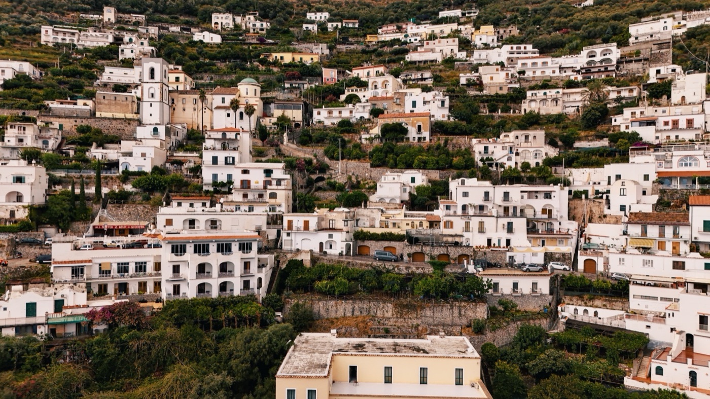 Aerial view of a hillside coastal village