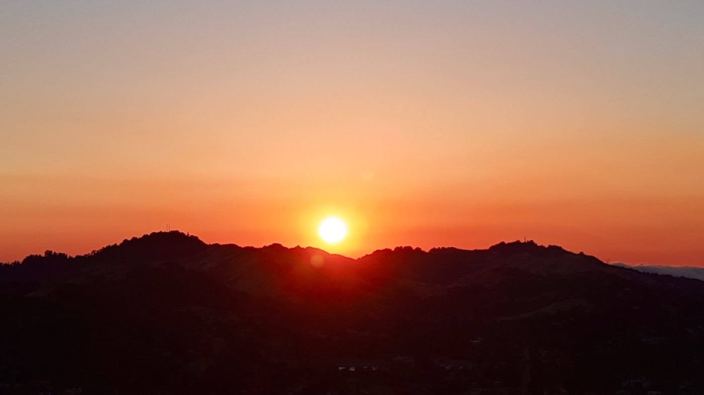 Sunset over a mountain ridge