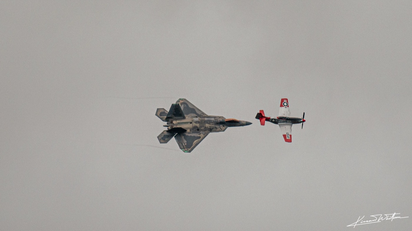 F-22 Raptor and P-51 Mustang in heritage formation